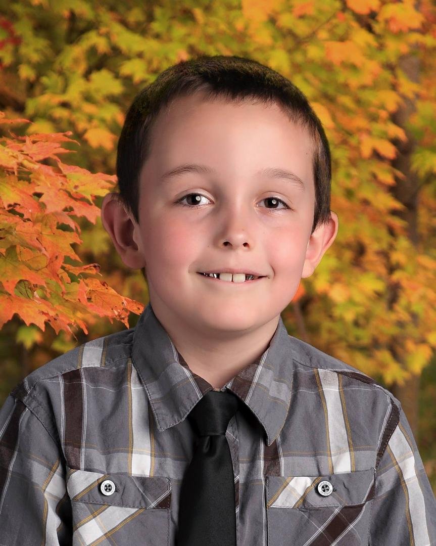 School Pictures are in. They screwed up again this year. No full picture of him standing. for almost 90 bucks they should of gotten them right