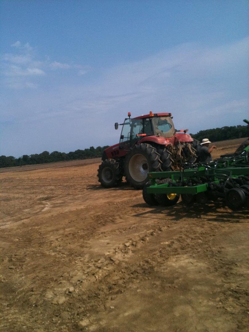 Setting planter up for beans to be planted.