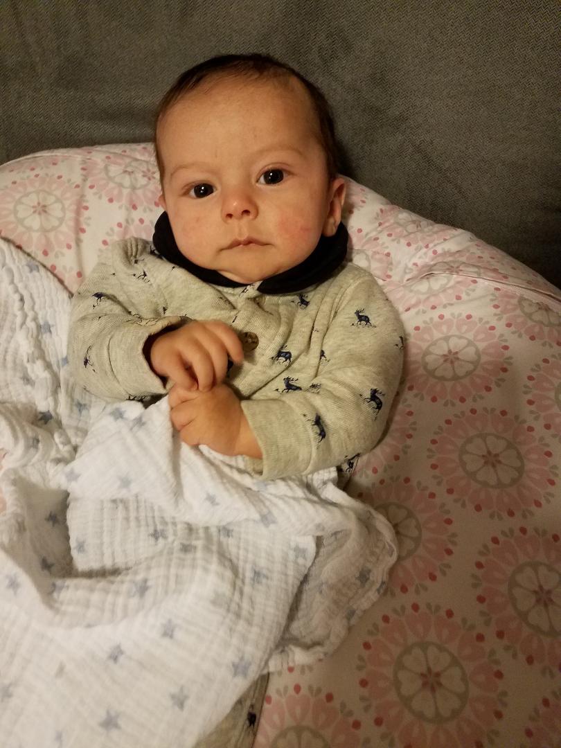 Rowan Kai Goldstein  ( newest grandchild) trying to figure out why the Skins went for 2 after 2 nd quarter TD.