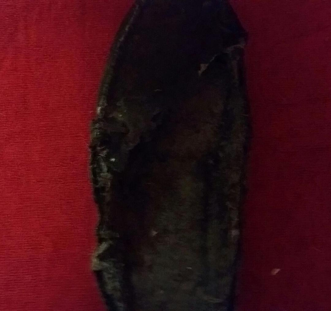 And here is another. This piece of art used to be a slipper. But my 8 1/2 year old dog tore it up today! Too old for tearing up my slippers.
