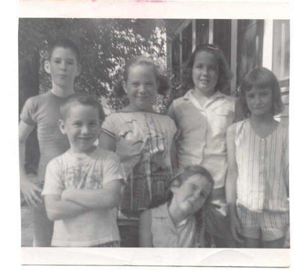 9th Street Gang - taken in side yard patio of Lisa Baker's house at 911 Pine. Back row: Chuck (hey, it's not much of a gang but it's MY gang) Dean, Mary Kate Gillespie, Elizabeth Ann Gillespie; front row: Benny Gillespe