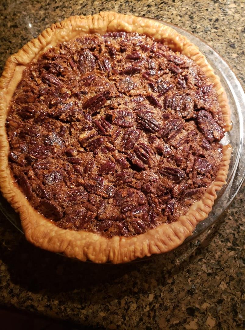 Bacon quiche, spinach, and homemade pecan pie for dinner tonight for birthday dinner. Not fancy but fine for me.