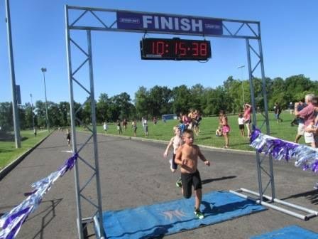 Triathlon athlete Jeffrey Moore, 7th 8 year old, 27th out of 91. This involved 100 meter swim, 4K bike ride, and 1K run.
http://www.speedy-feet.com/races/2017/0625/sun-ov.htm