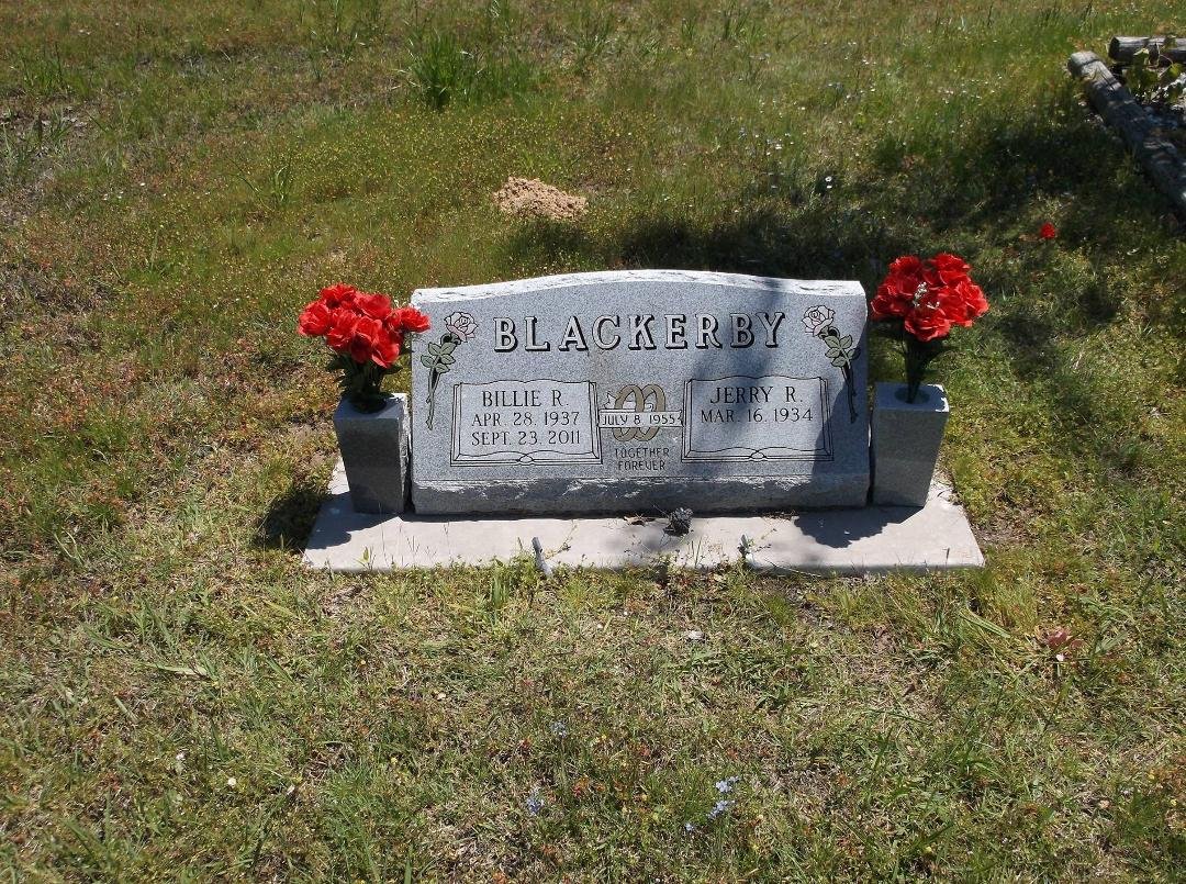 A few days late, Billie's birthday was April 28. Today, I put new flowers in the vases on her marker. The old ones were faded out.