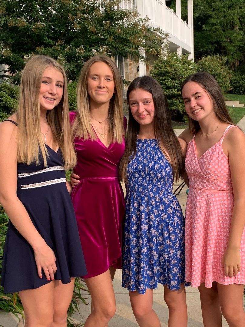 In the blue dress my oldest granddaughter now in High School!
