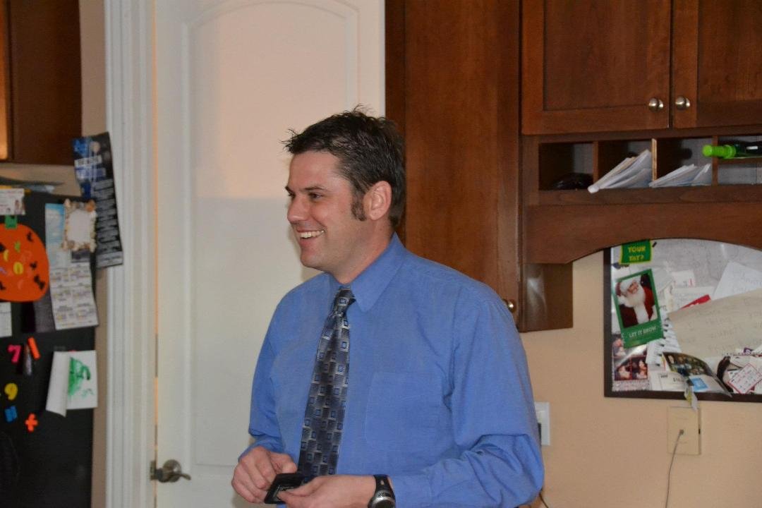 Adam Gemoets welcomes the family to the reception at his home.