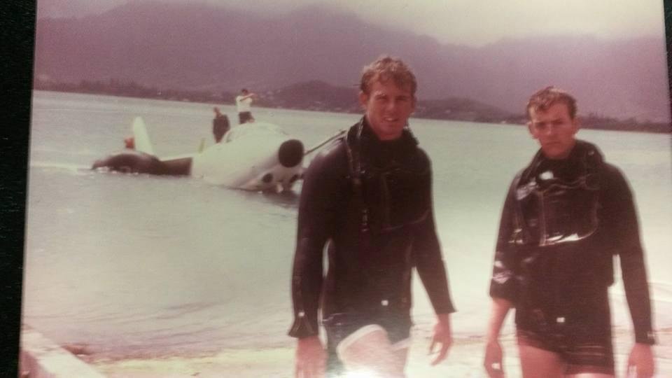 USS TAKELMA ships divers Greg Harris and Joe McIntosh after salvaging a crashed jet in Hawaii