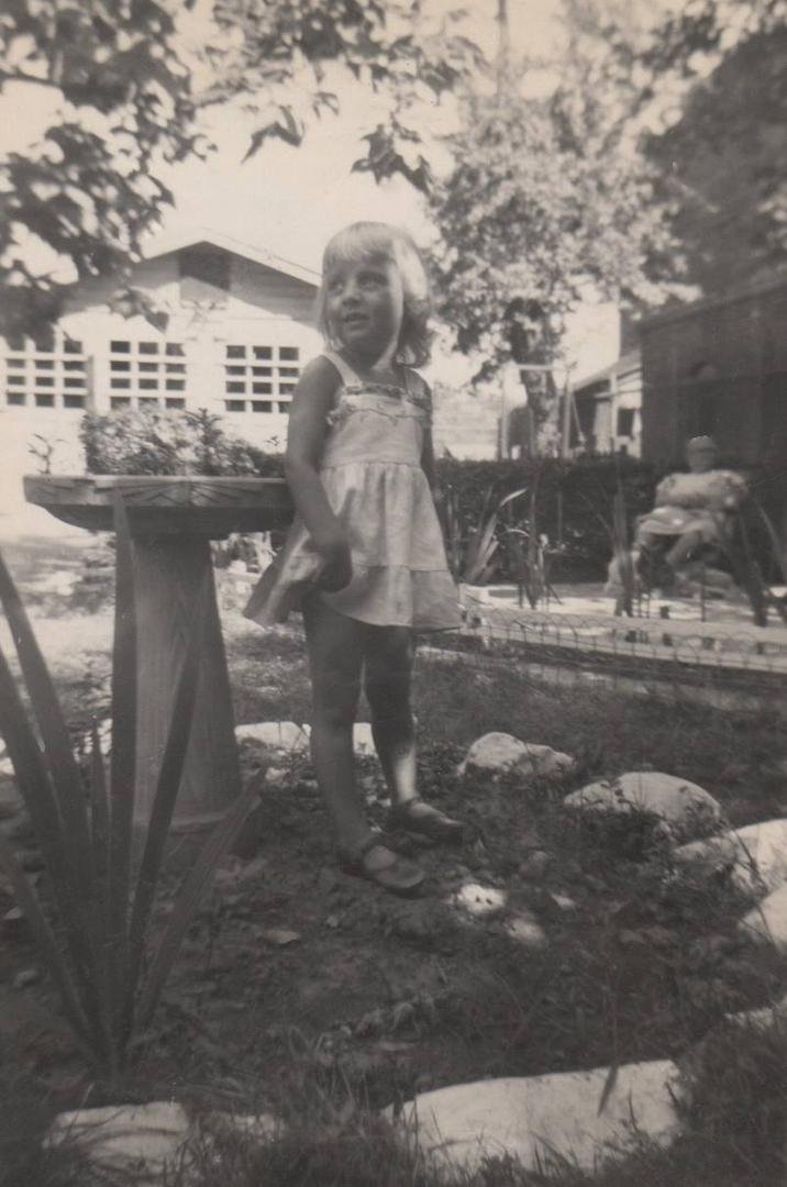 in backyard on Grove St