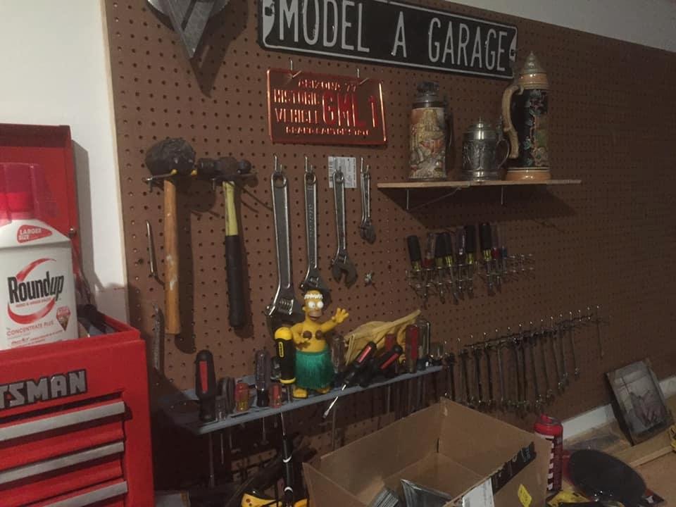 Half the peg board up at the new house