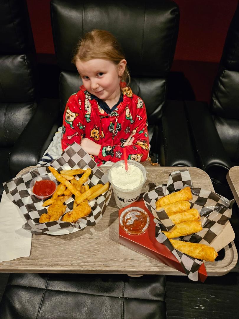 We went to the movies last night. I think Kaia went to snack on Mozz sticks, chix tenders,vanilla shake & my popcorn!! But we had fun while Mom & Dad are in Vegas.
