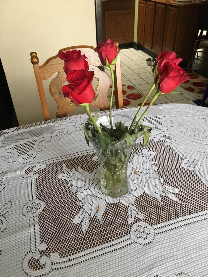 Pretty girl on corner selling roses = Grandma gets flowers!