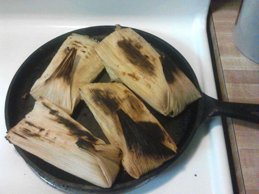 The coffee pot is on and salsa on the table and you see what's on the skillet heating up...