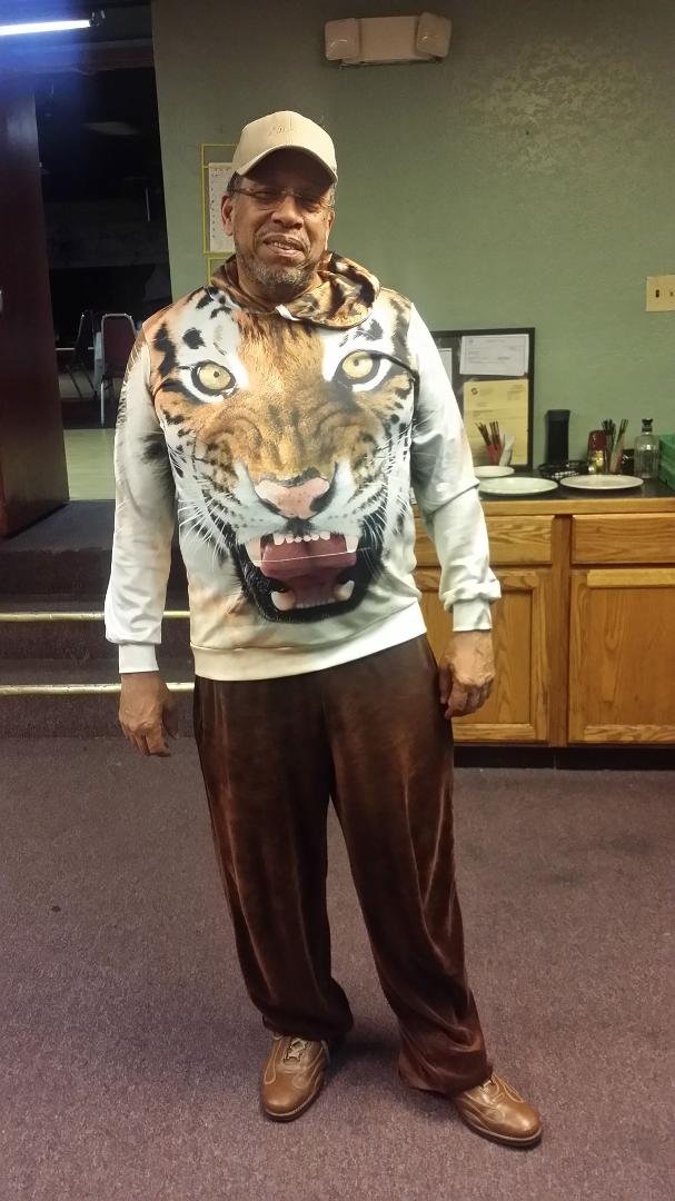 Yesterday I was feeling the Tiger in me with this pullover. My growl was mightier than my bite. We had a jovial time with friends at the Esquire Club watching Thursday night football.
