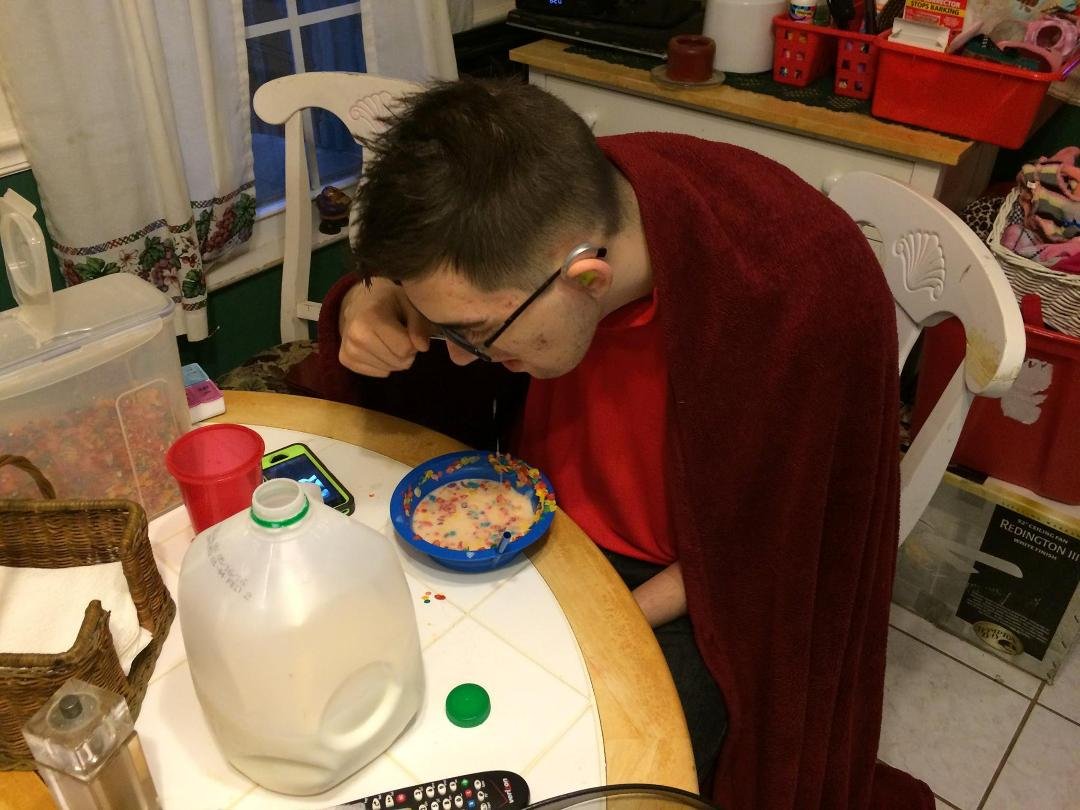 Rare wildlife photo where the subject tripped the camera switch. I managed to capture the feeding habits of the Northern Virginia Surly Teenager. This specimen is the male of the species and was recently rudely roused from