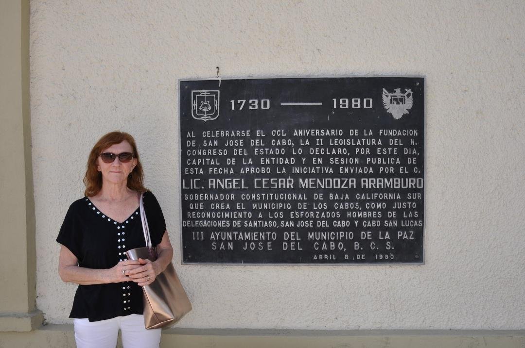 At the government building off the town square.