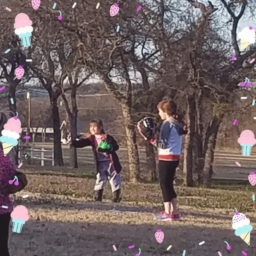 Jake's first T Ball practice. Throwing the ball to her partner
