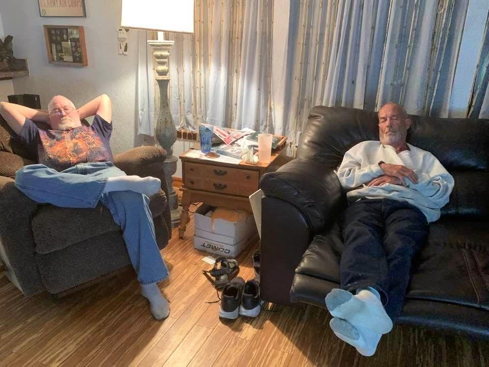Two retired guys are tired from working hard at retirement!