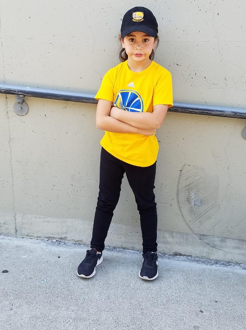 Delilah and I are waiting for the doors to open at Warriors game
