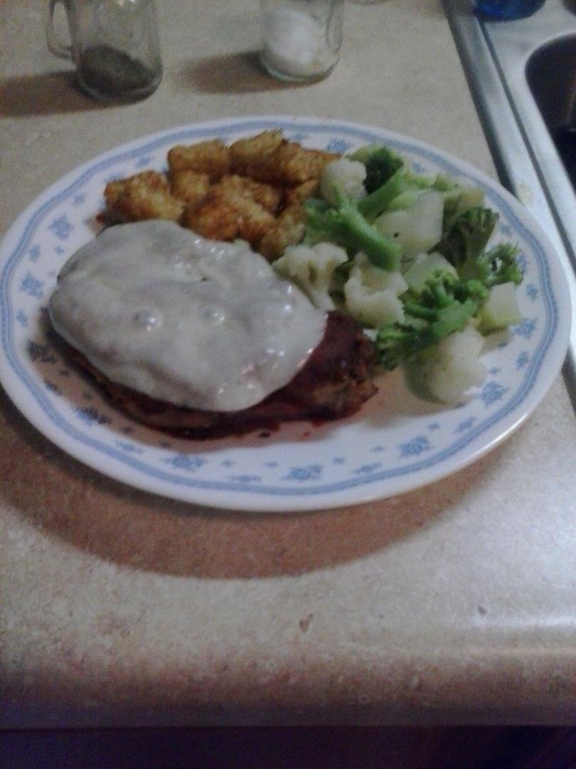 Pork Chop Pizziolla Tater Tots & Broccoli& Califlour!! Yummy!!