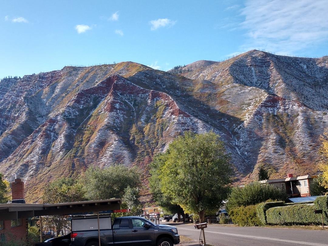 The view from our front yard...both the fall colors and snow on Red Mountain this morning! Enjoy your day!