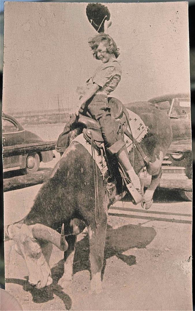 Liberated Young Arizona Cowgirl .... before women's lib , ... GO Girl ... watch out for his horns.