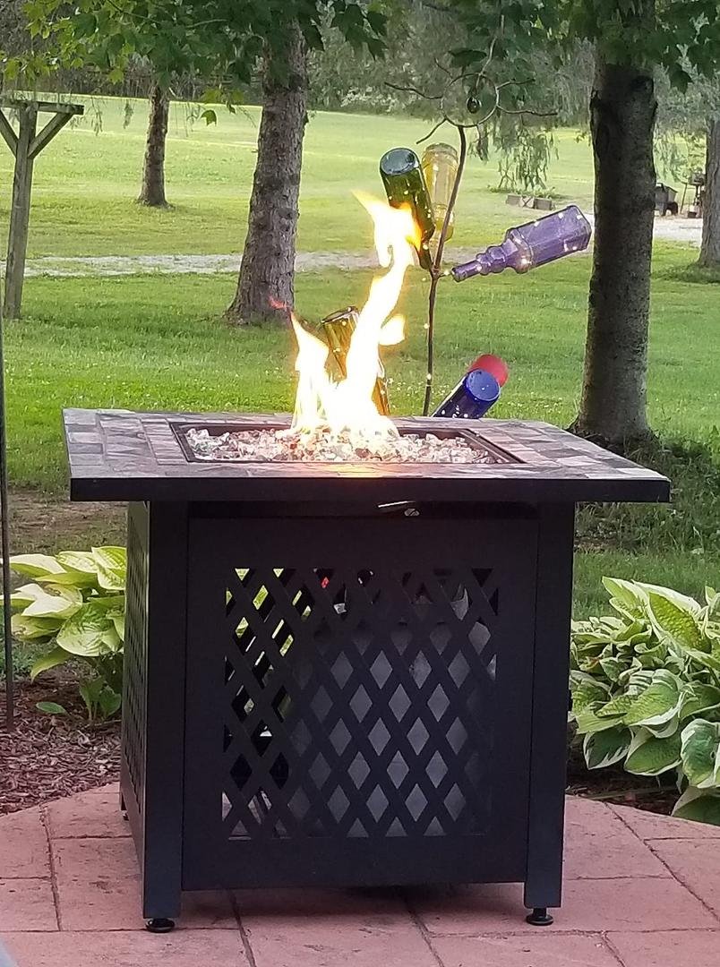 Beautiful evening with my honey and a fire, our kids got us the beautiful glass circling the fire for our anniversary yesterday thank you kids we love it❤