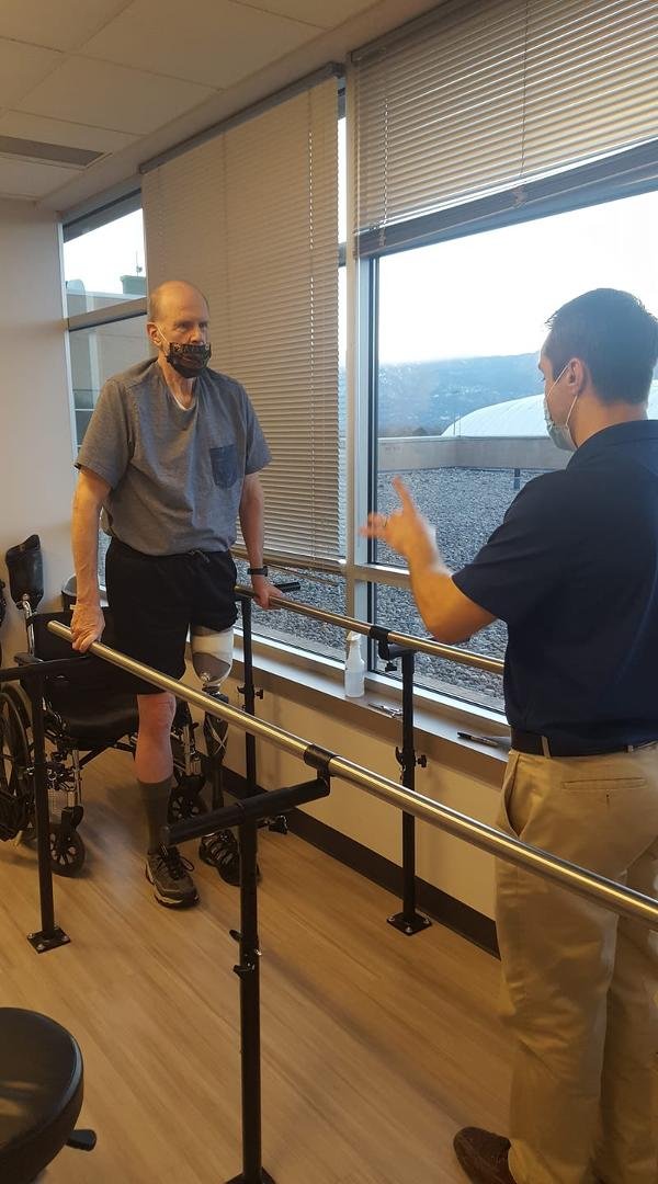 First steps with new prosthetic leg... "Baby Steps..."