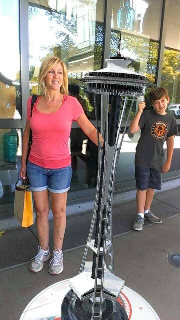 Julie and Connor enjoying the Space Needle. We thought it would be bigger.