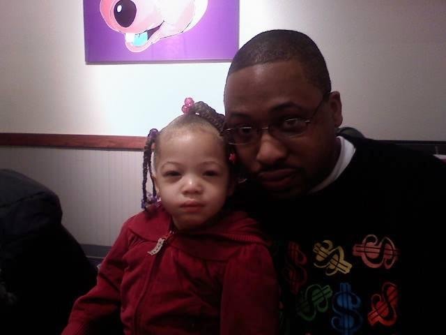 My son TJ & Laela. 2007 She loved a carry a purse then,
She still does.
