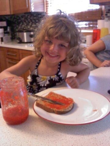 Here's Hannah making a peanut butter and jelly sandwich