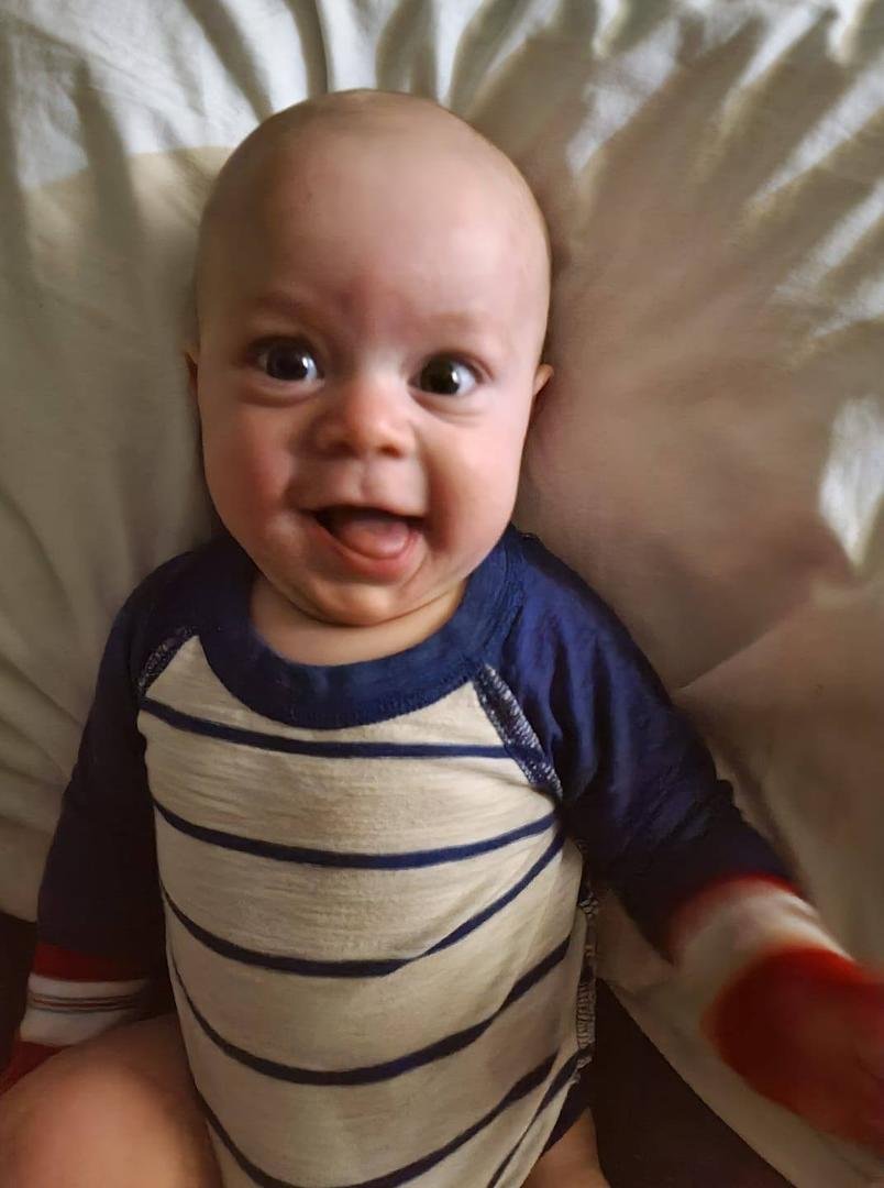 Grandma's tiniest peanut.  He is such a ham....not sure where that came from lol
