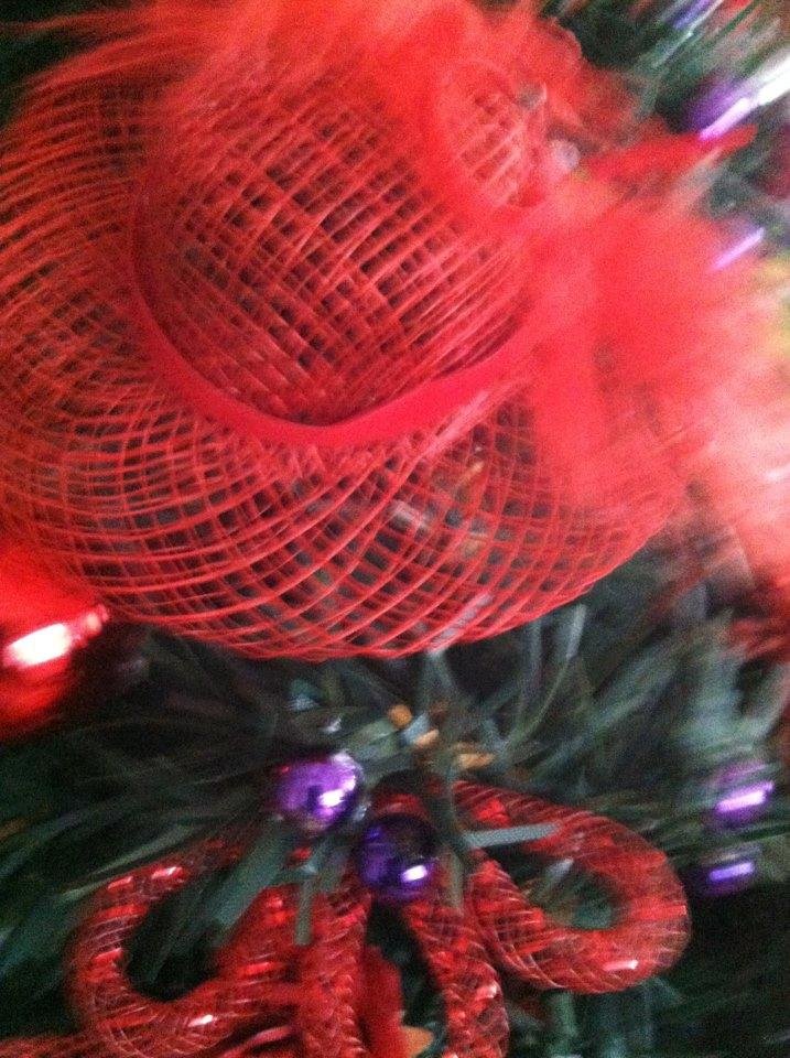 Four of the eight hats on my tree.