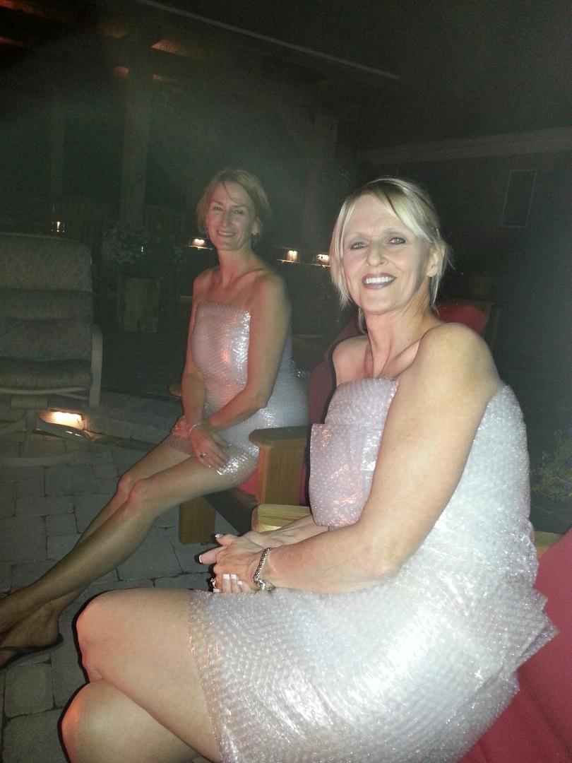 Cheryl and her sister Gloria came out to the fire pit wrapped in bubble wrap modeling for Dick and me.