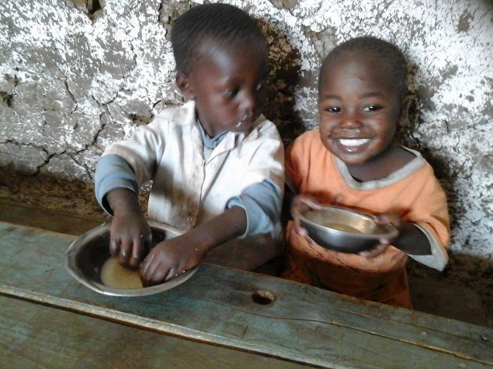 The smile says it all, so happy to have food.