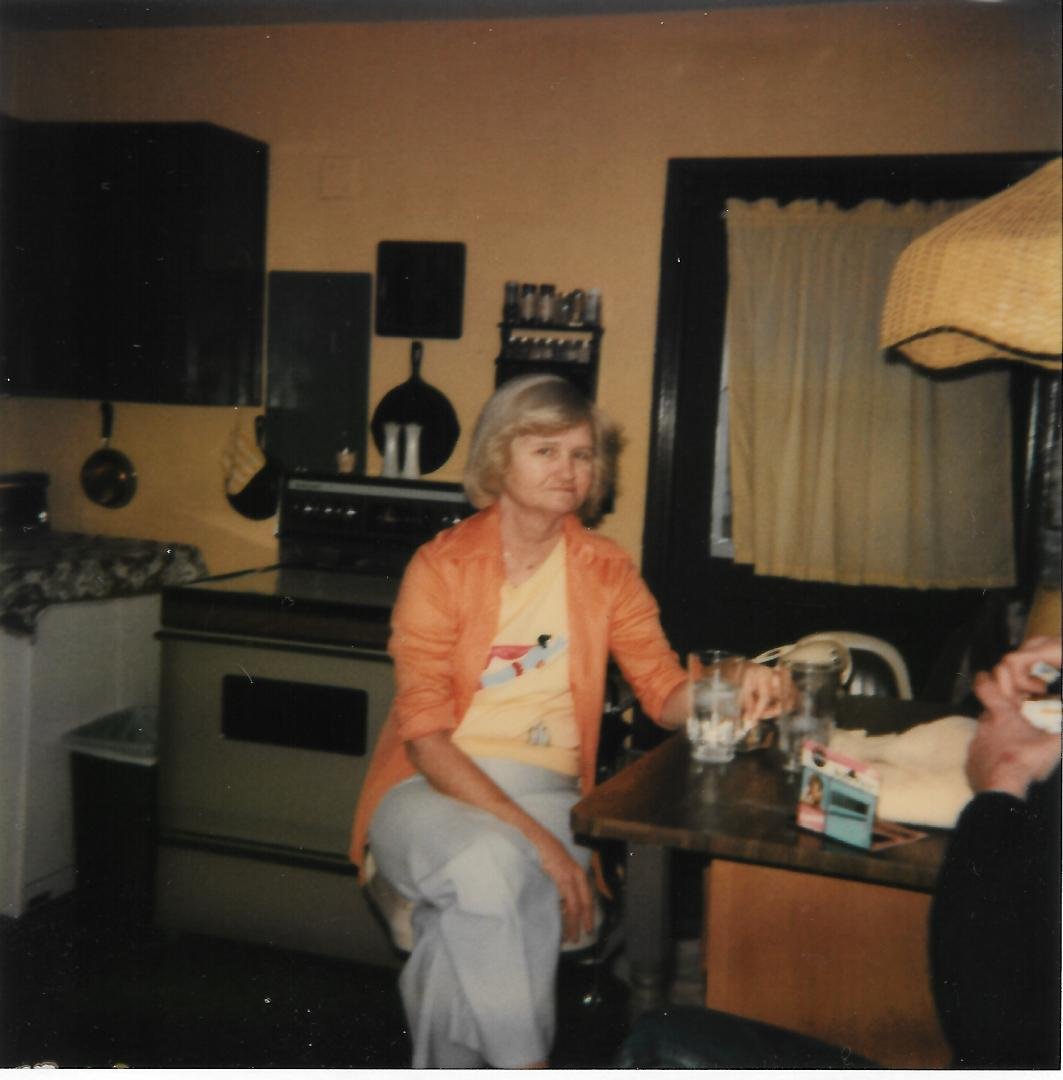 Genky( my mother) in the kitchen in my house on Coronado Place. 1970's.
