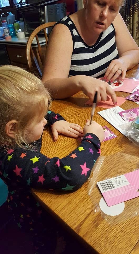 B doing her valentine's for preschool.  First year