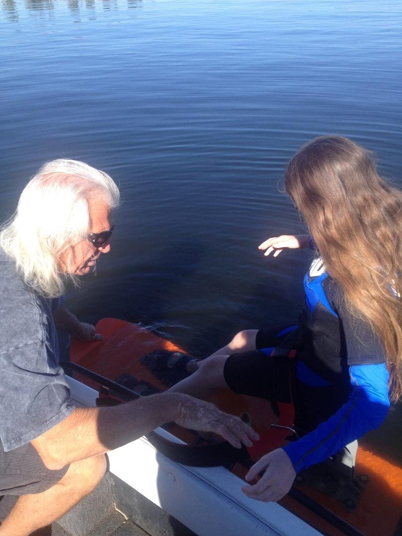 Mike Murphy coaching Courtney on the techniques of hydrofoil chair skiing.