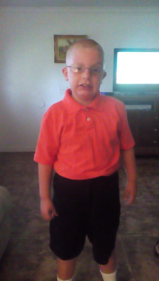 Little man is all ready for his first day of school.