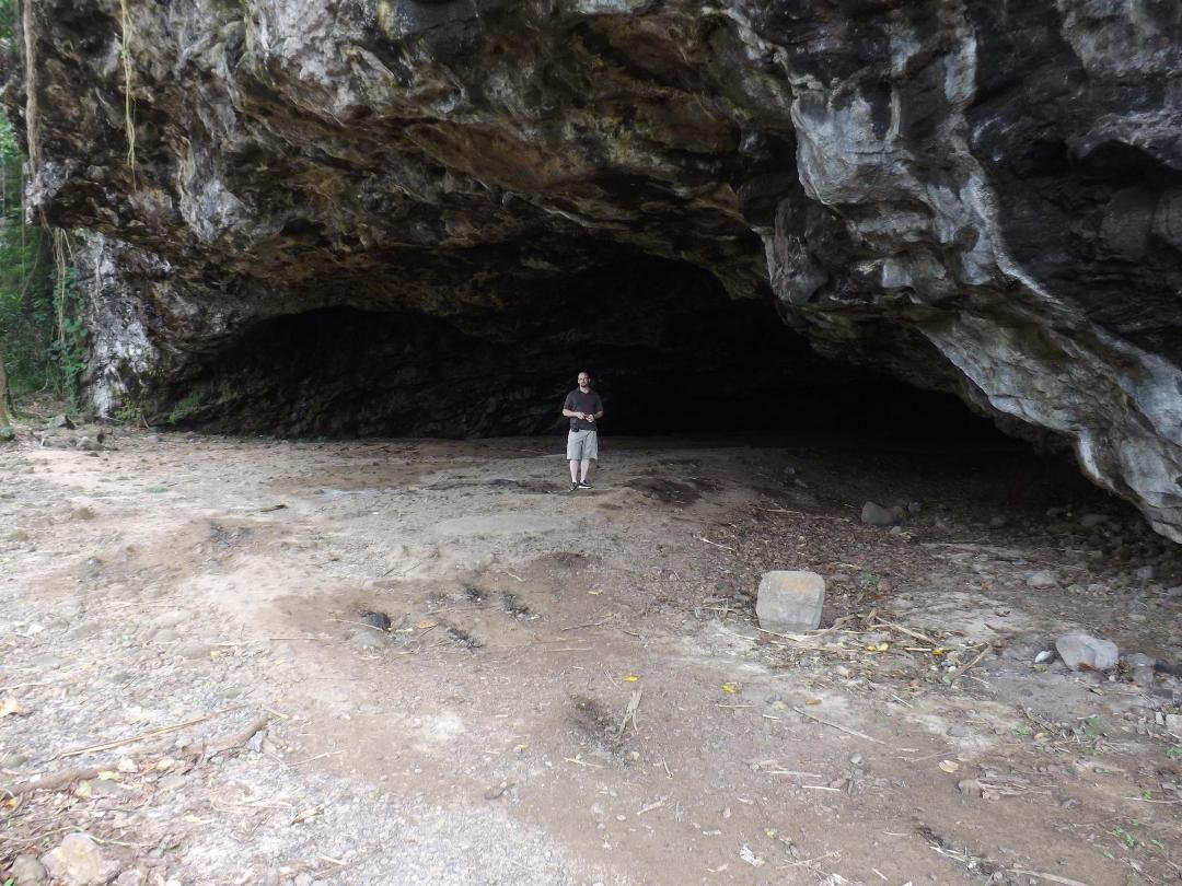 Gary coming out of the Lava-tube cave... Huge! (On Kauai's north shore)