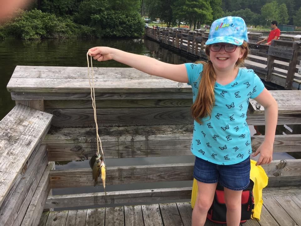Three Breams (2-1 granddaughter wins).  This was about as close to the fish as she would get.  Our fellow fisherfolks gladly took our catch.