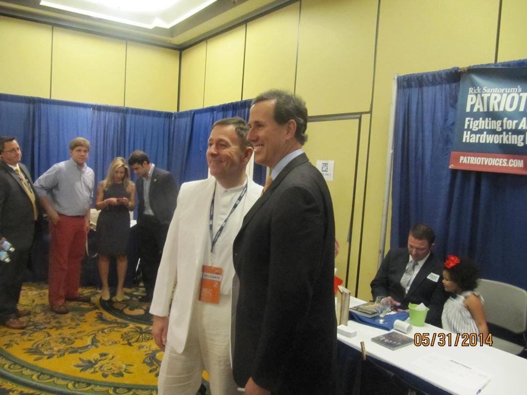 Another angle on "the Pose" in my traditional New Orleans White Linen - Photography by James M Leonard ... I explained the sartorial tradition to the Senator (Seersucker is the alternative, by the way). Maybe next time he'