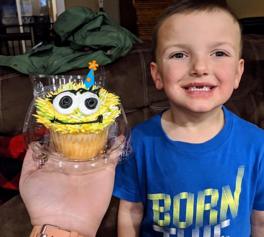 a boy and HIS cupcake, mommy got for him