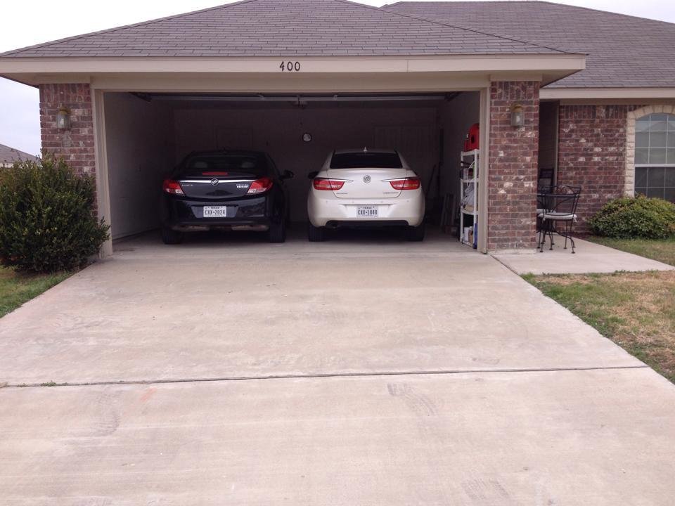 We succeeded both cars in the garage!!