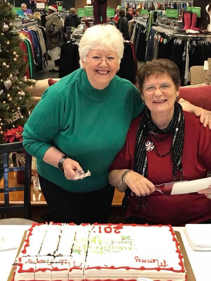 Kathy and Beryl cutting and serving the cake at the Revive Christmas party last night.