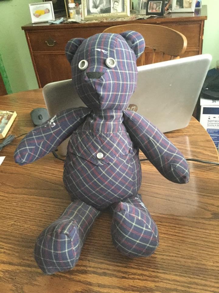 This is my Jerry bear. It is made from one of Jerry’s shirts. The white spots are stains from when he was doing his woodworking and painting.