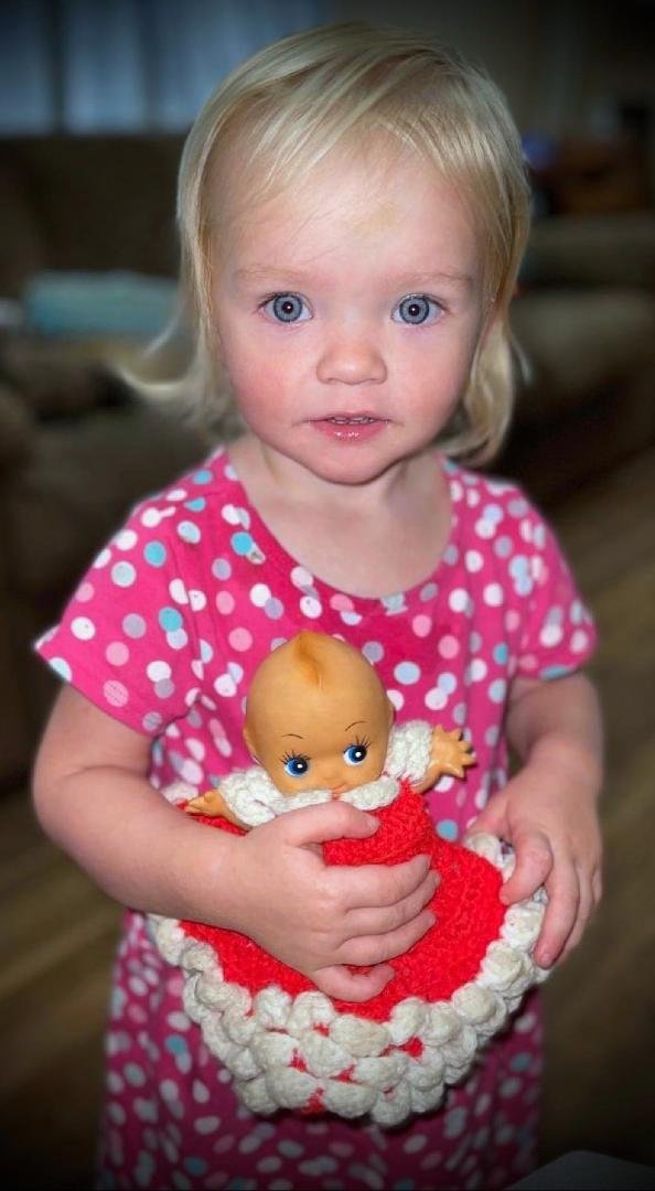 Bethany loves this little Kewpie doll, Joe's mom Lois made the dress many years ago in the late 80s or early 90s. ( may she rest in peace). Emily and Alaina also loved playing with it also when they were small.