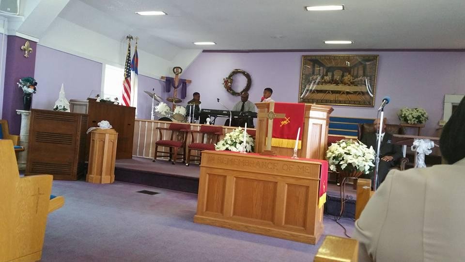 Trevor Johnson  singing,  "No weapon formed against me shall prosper " at Johnson Temple Church of God in Christ.