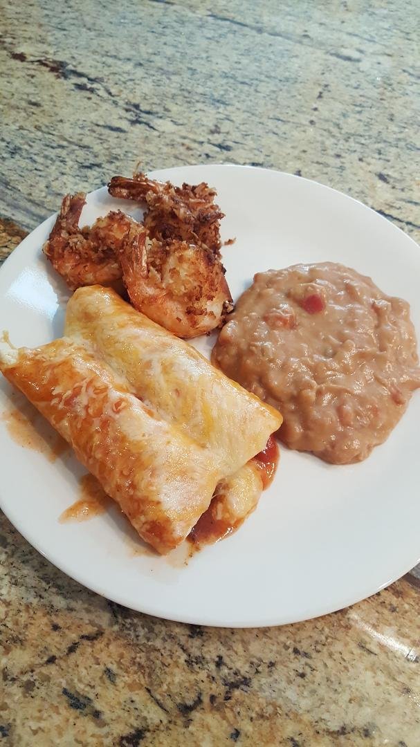 Here's what's for dinner. Beef enchiladas, refried beans & coconut shrimp!!  Yummy!!