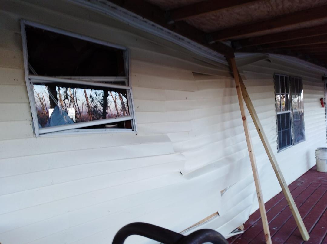 Our neighbor told us to leave and he would take care of the house for us. You know, he didn't think it was safe!