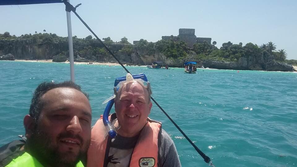 Snorkeling at the ruins of Tulum with my son in law Dario